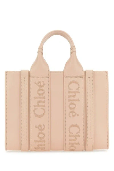 Shop Chloé Chloe Woman Pastel Pink Leather Small Woody Shopping Bag