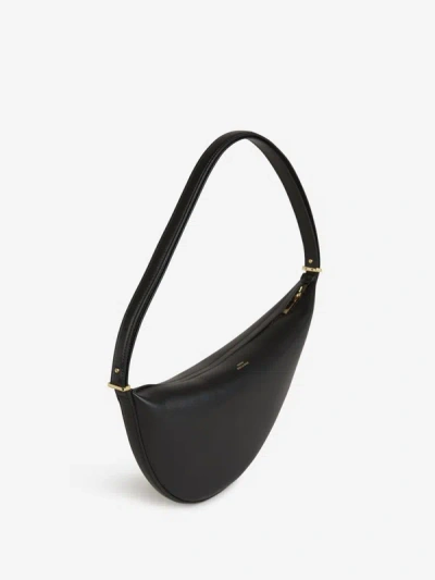 Shop Totême Scooped Sling Shoulder Bag In Negre