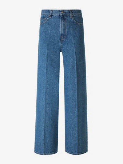 Shop Totême Wide Leg Jeans In Ironed Pleat Detail