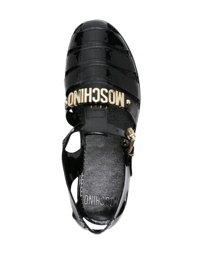 Shop Moschino Sandals With Logo In Black