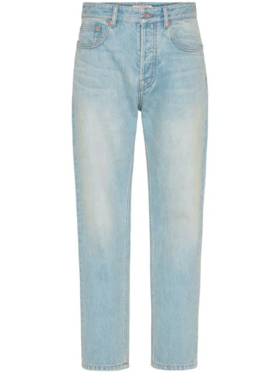 Shop Valentino Vlogo Denim Jeans In Clear Blue