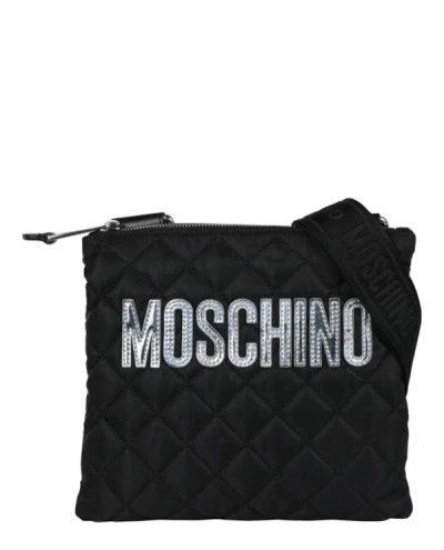 Shop Moschino Quilted Logo Crossbody Bag In Multi