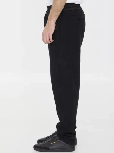 Shop Saint Laurent Track Pants In Black