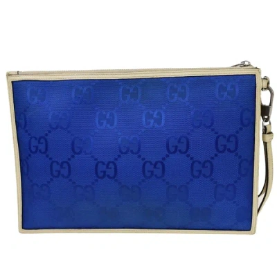 Shop Gucci Off The Grid Blue Canvas Clutch Bag ()