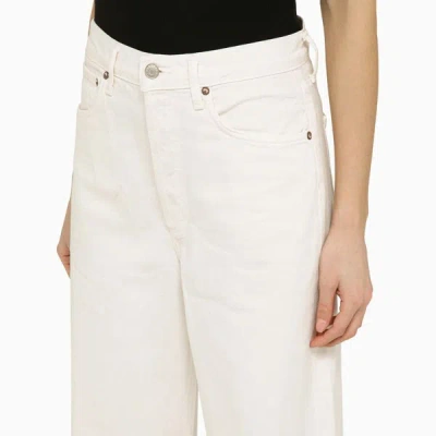 Shop Agolde White Denim Flared Jeans In Beige