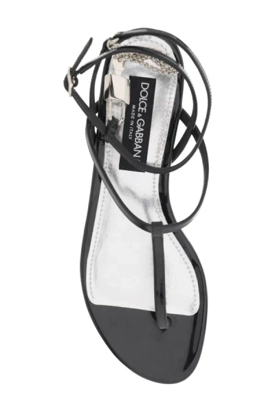 Shop Dolce & Gabbana Patent Leather Thong Sandals With Padlock In Black