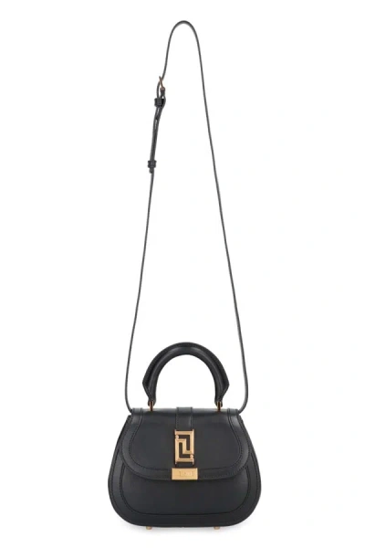Shop Versace Greca Goddess Leather Mini Bag In Black