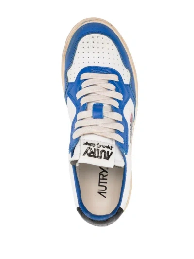 Shop Autry Medalist Super Vintage Low Sneakers In Sv10 Wht/blue/blk