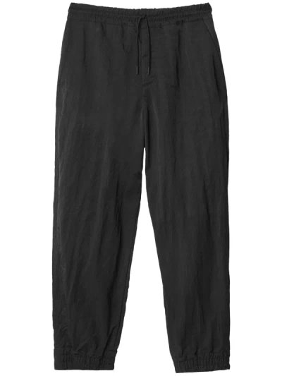 Shop Burberry Men Drawstring Trousers In Black
