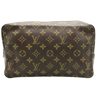 Pre-owned Louis Vuitton Trousse De Toilette Canvas Clutch Bag () In Brown