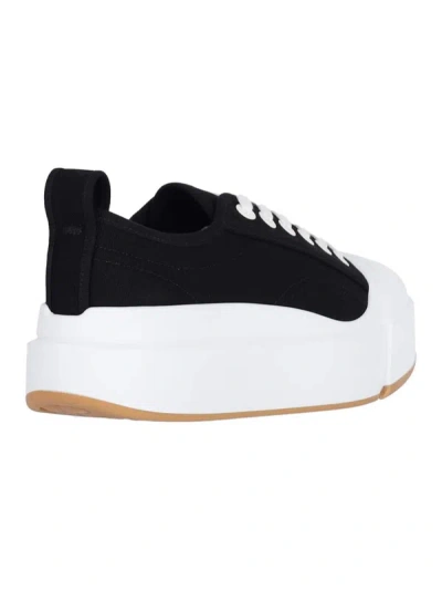 Shop Bottega Veneta Sneakers In Black