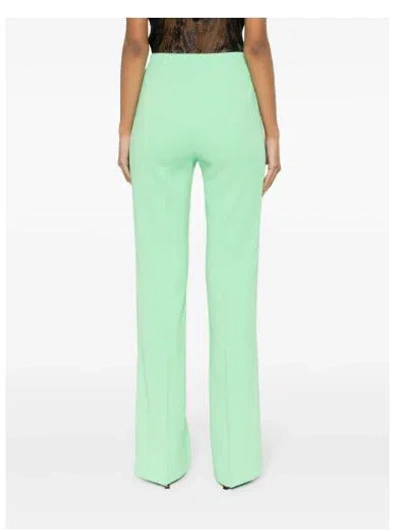 Shop Pinko Trousers In Green