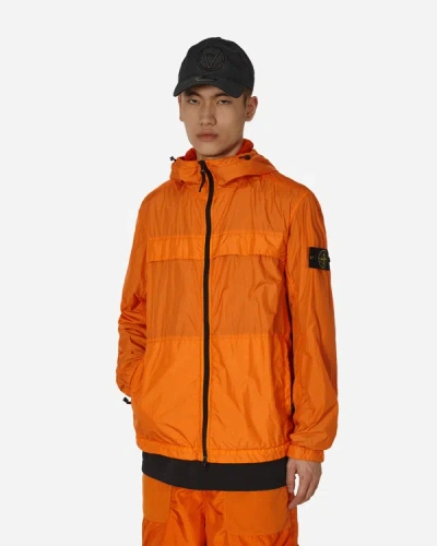 Shop Stone Island Garment Dyed Crinkle Reps R-ny Hooded Jacket In Orange