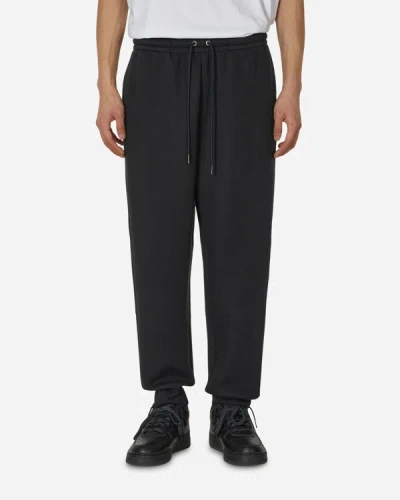 Shop Nike Tech Fleece Reimagined Sweatpants In Black