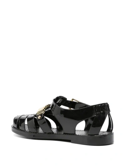 Shop Moschino Sandals With Logo Plaque In Black