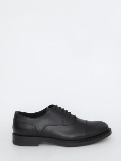 Shop Tod's Lace-ups In Black Leather