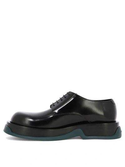 Shop Jil Sander Lace-up Shoes With Contrasting Sole In Black