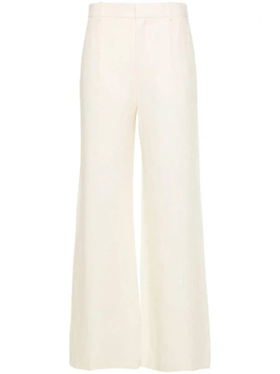 Shop Chloé Linen Flared Trousers In White