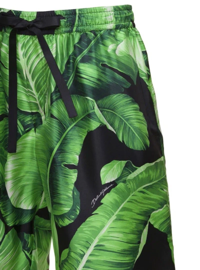 Shop Dolce & Gabbana Black & Green Bermuda Shorts With All-over Leaf Print In Silk Man