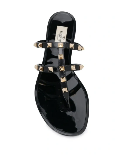 Shop Valentino Garavani Rockstud Rubber Thong Sandals In Black