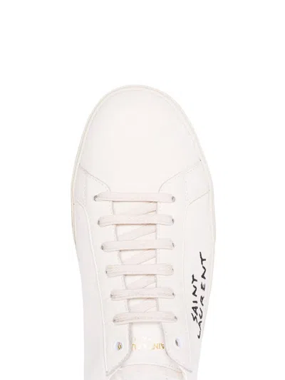 Shop Saint Laurent Sneakers & Slip-on In White