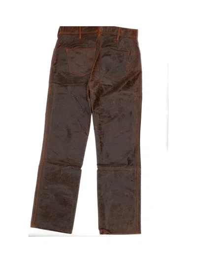 Shop Séfr Trousers In Coated Faux Brown