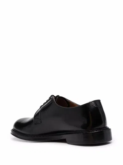 Shop Doucal's Derby Shoes. In Black
