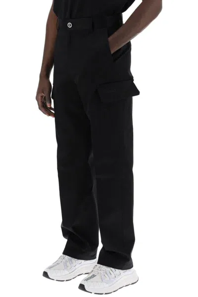 Shop Versace Cotton Gabardine Cargo Pants In In Black