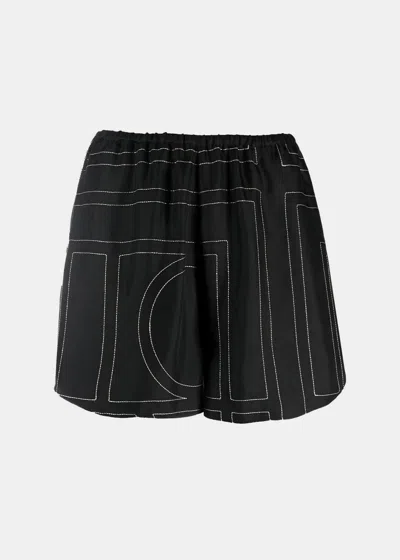 Shop Totême Toteme Black Monogram Silk Pyjama Shorts