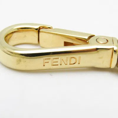 Shop Fendi Yellow Metal Wallet Jewelry ()