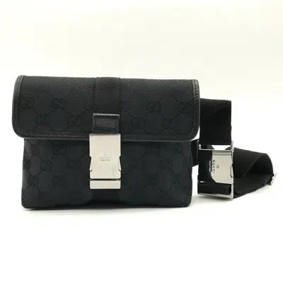 Shop Gucci Black Canvas Clutch Bag ()