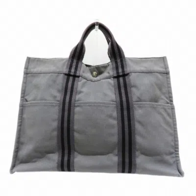 Shop Hermes Hermès Grey Canvas Tote Bag ()