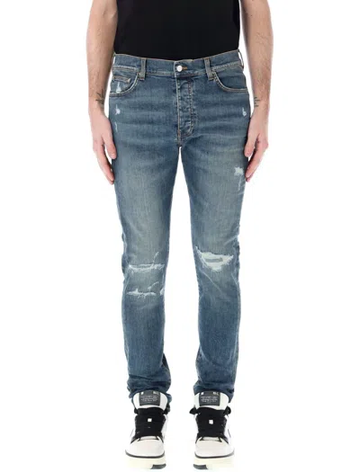 Shop Amiri Distressed Skinny Jeans In Crafted Indigo