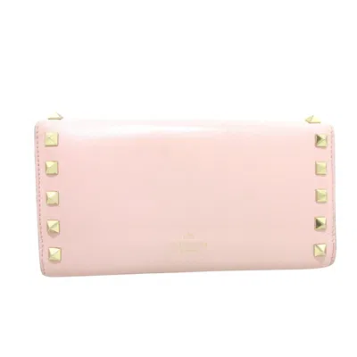 Shop Valentino Garavani Rockstud Pink Leather Wallet  ()