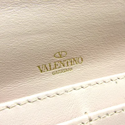 Shop Valentino Garavani Rockstud Pink Leather Wallet  ()