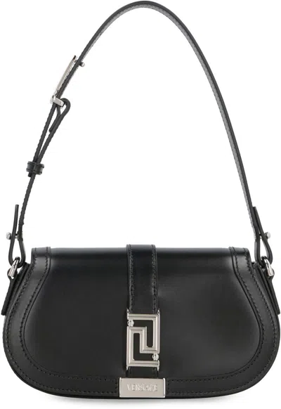 Shop Versace Greca Goddess Mini Leather Shoulder Bag In Black