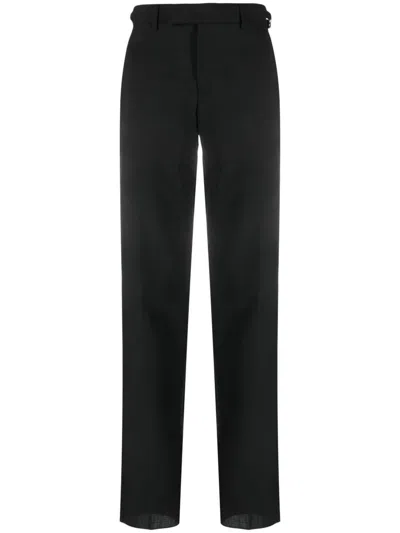 Shop Versace Trousers In Black