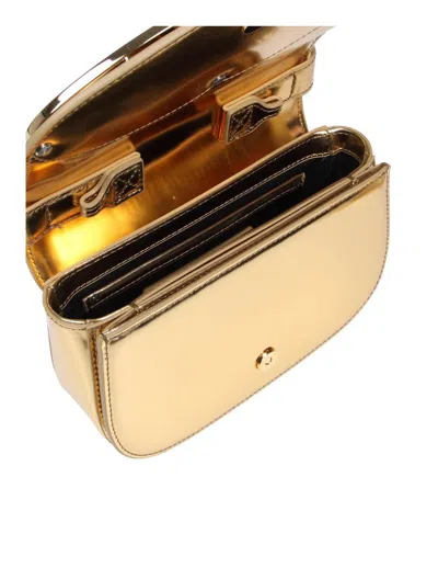 Shop Diesel Structured Bag In Mirrored Leather In Gold