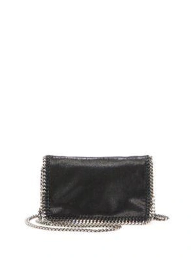 Shop Stella Mccartney Falabella Faux Leather Fold-over Chain Crossbody Bag In Black