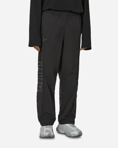 Puma X Dapper Dan Monogram-patterned Drawstring Trousers In Black