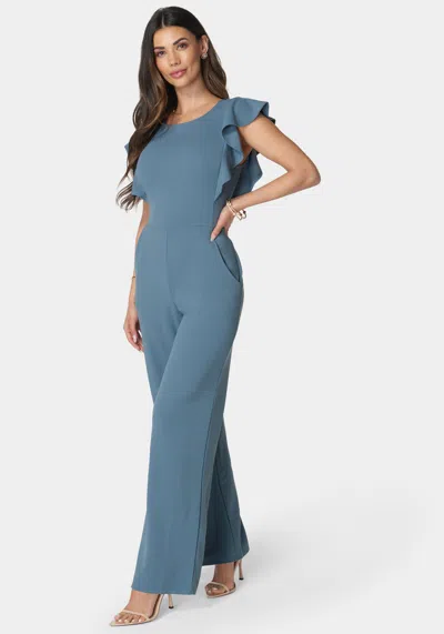 Bebe Flutter Sleeve Core Jumpsuit In Denim