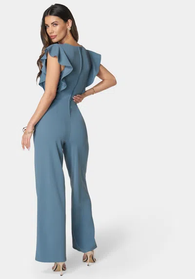 Bebe Flutter Sleeve Core Jumpsuit In Denim