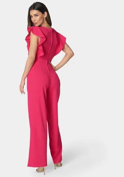 Shop Bebe Flutter Sleeve Core Jumpsuit In Pink