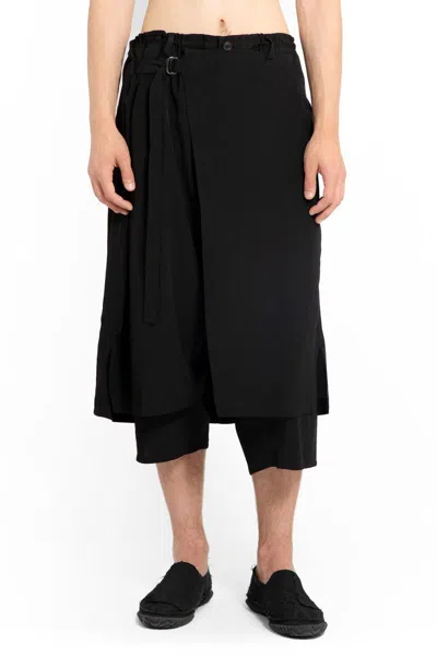 Shop Yohji Yamamoto Trousers In Black