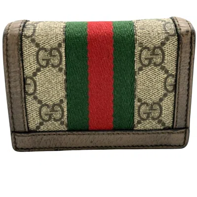 Shop Gucci Brown Canvas Wallet  ()