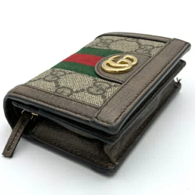 Shop Gucci Brown Canvas Wallet  ()