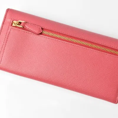 Shop Prada Saffiano Pink Metal Wallet  ()