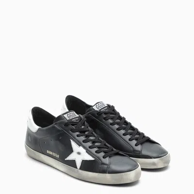 Shop Golden Goose Super Star Sneakers Black/white