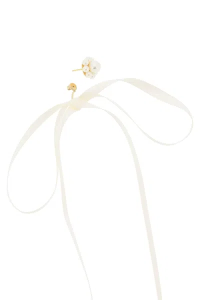 Shop Simone Rocha Button Pearl Earrings With Bow Detail.