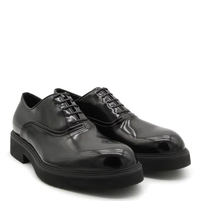 Shop Ferragamo Flat Shoes Black